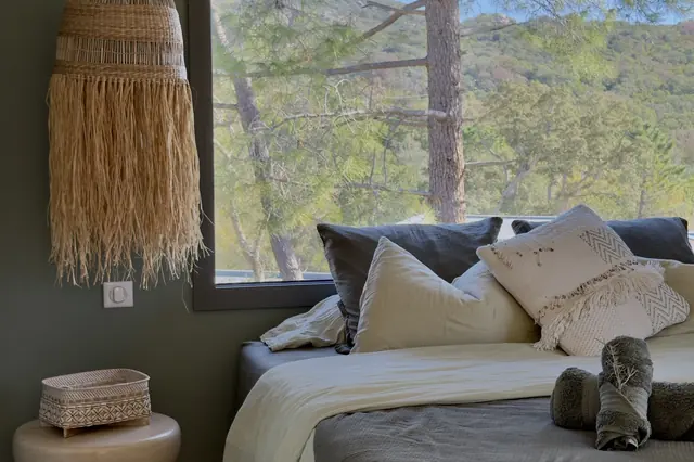 Bedroom looking out onto the pines